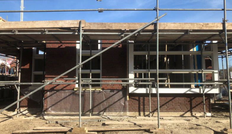 Nieuwe en oude foto's van de bouw van Kavel 5 op De Melkhal Enschede!