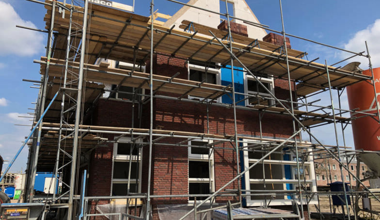 Nieuwe en oude foto's van de bouw van Kavel 5 op De Melkhal Enschede!