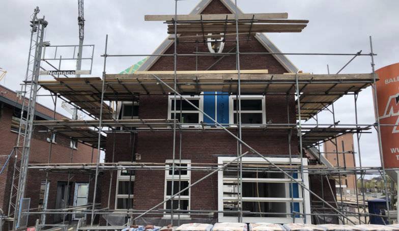 Nieuwe en oude foto's van de bouw van Kavel 5 op De Melkhal Enschede!