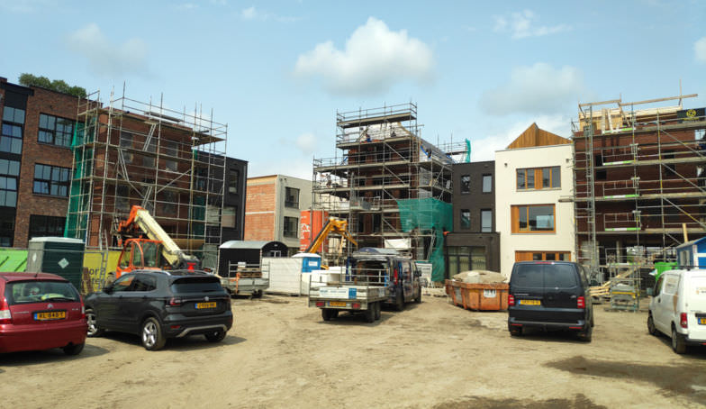 Nieuwe en oude foto's van de bouw van het Statenpand E1 op de Melkhal Enschede!